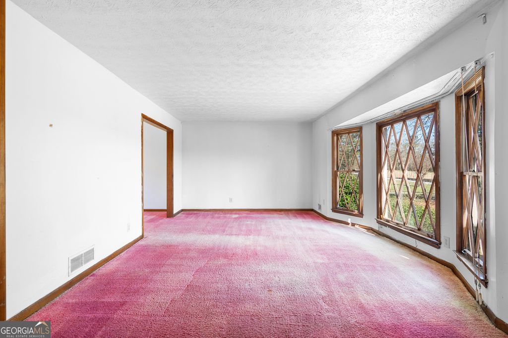 Photo of 5083 Flakes Mill Road, Ellenwood, GA 30294 (MLS # 10699084)