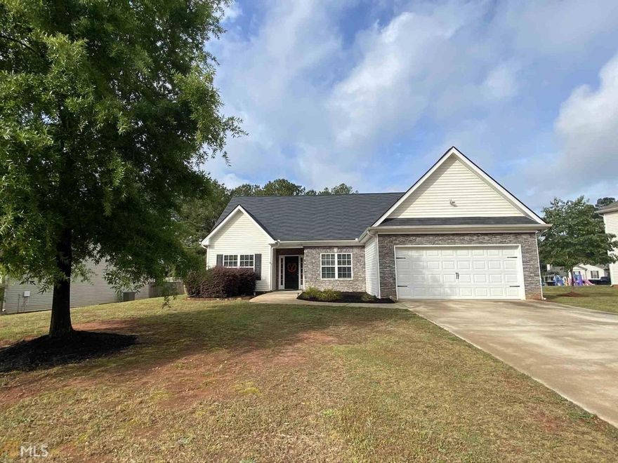 This well-maintained split bedroom ranch home features a large & spacious floor plan. This spacious kitchen features tile floors and solid surface counter tops and is open to the  large living room that  will accommodate most any furniture and gathering.  The separate dining room will be great for all your hosting needs. Ready for a game of football or need room for children's playground equipment, then search no further. This backyard is screaming weekend fun.  This home has been very well maintained and it shows.  All you need to do is unpack your belongings and hang the pictures.  Welcome to your new home. NO HOA