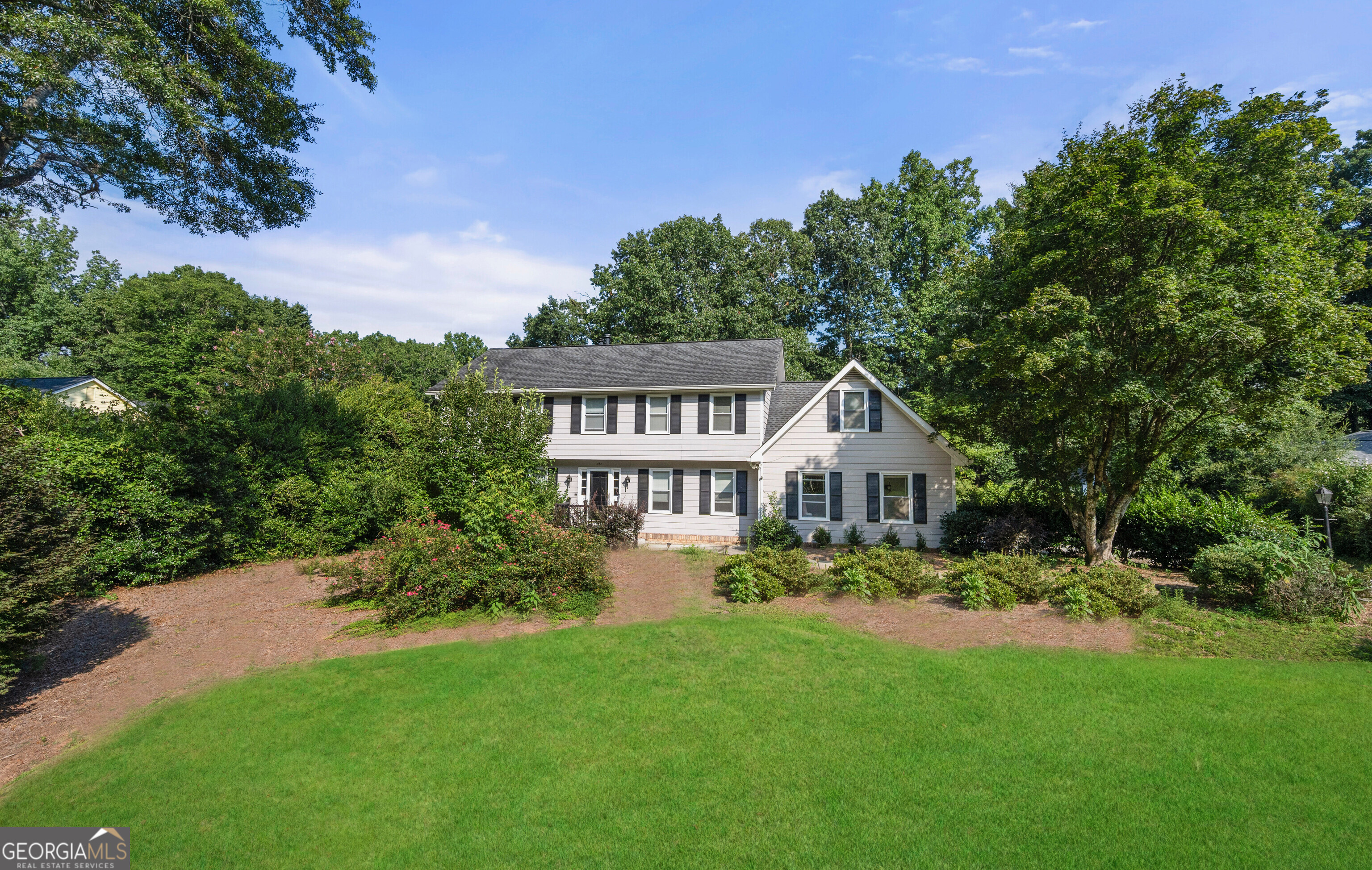PRICE REDUCTION!! Welcome to 361 Clear Spring Ct - a spacious 5-bedroom, 3.5-bath gem nestled in a peaceful cul-de-sac in the heart of East Cobb. Located in one of Georgia's top-rated school districts and surrounded by beautiful parks, a close-knit community, and convenient East Cobb shopping, this home offers both comfort and incredible potential. Inside, you'll find plenty of room for everyone with a versatile floor plan and a finished basement perfect for entertaining, a home office, or guest space. The heart of the home extends outdoors to a screened-in porch and adjoining back deck-ideal for barbecues and summer gatherings. Take a dip in your private in-ground pool or simply enjoy the serenity of your backyard oasis. PRICE REDUCTION! SELLERS ARE MOTIVATED!! Don't miss your chance to create the lifestyle you've always wanted in East Cobb!