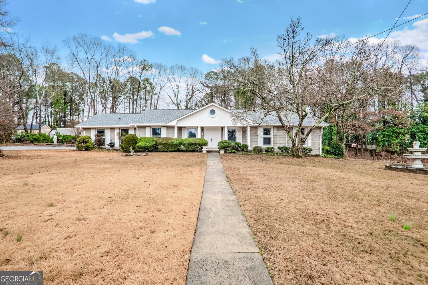 Charming and spacious ranch home available now in a prime Marietta location. This 3-bedroom, 2-bathroom ranch home offers comfort and convenience. Features include an updated kitchen with double ovens, a separate dining room, two living rooms, and an enclosed sunroom perfect for relaxing. The home sits on a huge double lot with a level front and back yard, ideal for outdoor activities. Rest assured knowing the roof is new and all windows have been replaced. Parking is a breeze with a 2-car carport and additional driveway space. Located in an excellent Marietta area with top-rated schools.