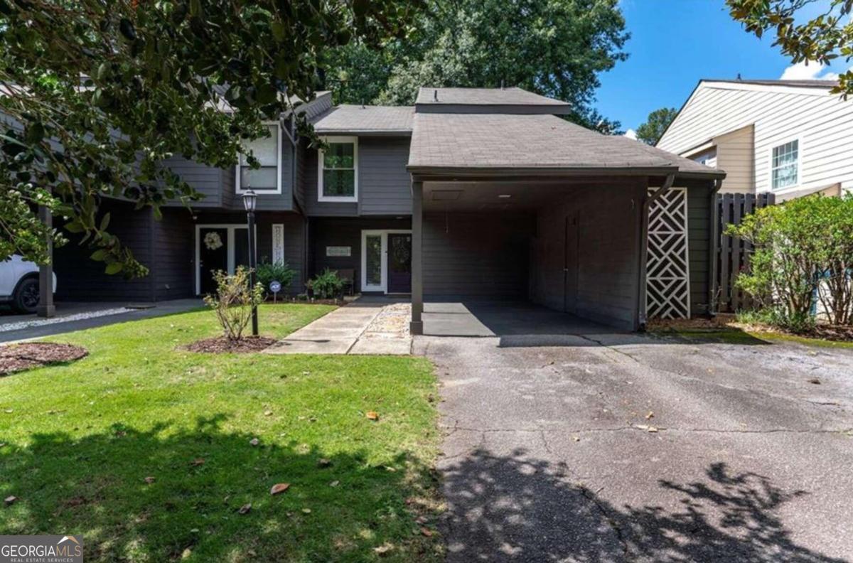Back on the market at no fault of the seller! Buyer's financing fell through.  This beautiful condo is a stone's throw to the shopping/ restaurants that downtown Alpharetta offers (0.8  miles). A beautiful community pool for the kids. And award winning schools in north Fulton. Upon entering the condo there is a half  bathroom, and vaulted ceilings in the living room. The spacious living room hosts a gas starting/wood burning fireplace. Updated kitchen  overlooks living room. Granite countertops with stainless steel appliances. The kitchen also overlooks a breakfast area that hosts the  laundry room. Off of the kitchen you will find a walk out deck to a serene fenced in back yard. The second floor hosts the remaining  bedrooms and bathrooms. Master bathroom hosts a walk in shower and a garden tub as well as plenty of counter space, and a walk in  closet. The two additional bedrooms share a bathroom with a shower/tub combo. Must see to appreciate!