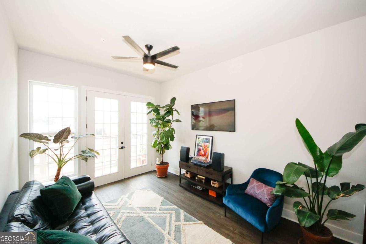 UNBEATABLE LOCATION - 5 minutes from the Eastside Beltline, walking distance to restaurants, shops and grocery stores. Minutes from Krog Street Market, Edgewood Shopping Center, downtown, and more. Hard to find condominium rental with a spacious open floor plan. This 1br/1bt offers 10' ceilings, hardwood floors, and abundant natural light from the wall to wall French doors in the main living space and the expansive windows in the bedroom. French doors open on a sizable balcony on which to relax and enjoy the evening sky. The kitchen is a dream set up with great space for 2 cooks and SS appliances. Washer and dryer in unit. This exceptional building offers a quiet layout with only 3 units on each wing. Building amenities include fitness center, Club room, rooftop deck, and retail space on lowest level.