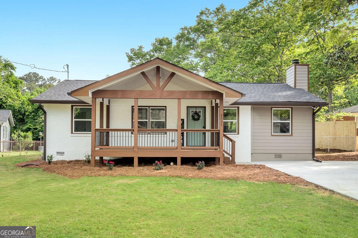 ARE THE HIGH INTEREST RATES STILL HOLDING YOU BACK? NO PROBLEM, THIS MOTIVATED SELLER IS WILLING TO CONTRIBUTE TO A 2/1 RATE BUY-DOWN TO HELP WITH THOSE HIGH MONTHLY PAYMENTS! Step inside a renovation that goes beyond the typical flip, this Smyrna gem has been thoughtfully reimagined, FULLY PERMITTED, and rebuilt with craftsmanship and care. Welcome to 2831 Ivanhoe Lane SE, a beautifully expanded 3-bedroom, 2.5-bath home in desirable Concord Estates, just minutes from The Battery, I-285, South Cobb Drive, and top-rated schools. The open-concept layout offers a seamless flow from the bright living room to a designer kitchen complete with quartz countertops, stainless steel appliances, and soft-close cabinetry, perfect for everyday living and effortless entertaining. Unwind in the luxurious primary suite, featuring a double vanity and a spa-inspired tiled shower designed for total relaxation. Enjoy Georgia's best seasons from the inviting front porch or host guests in the spacious backyard, ideal for creating lasting memories. This home checks every box: new roof, windows, HVAC, electrical, plumbing, insulation, siding, driveway, and full interior & exterior paint, all FULLY PERMITTED and up to code, giving you modern comfort and long-term peace of mind. Whether you're a first-time buyer, downsizing, or searching for a smart investment in a thriving area, this home is ready to impress. Schedule your private tour today and experience the difference that true quality makes.