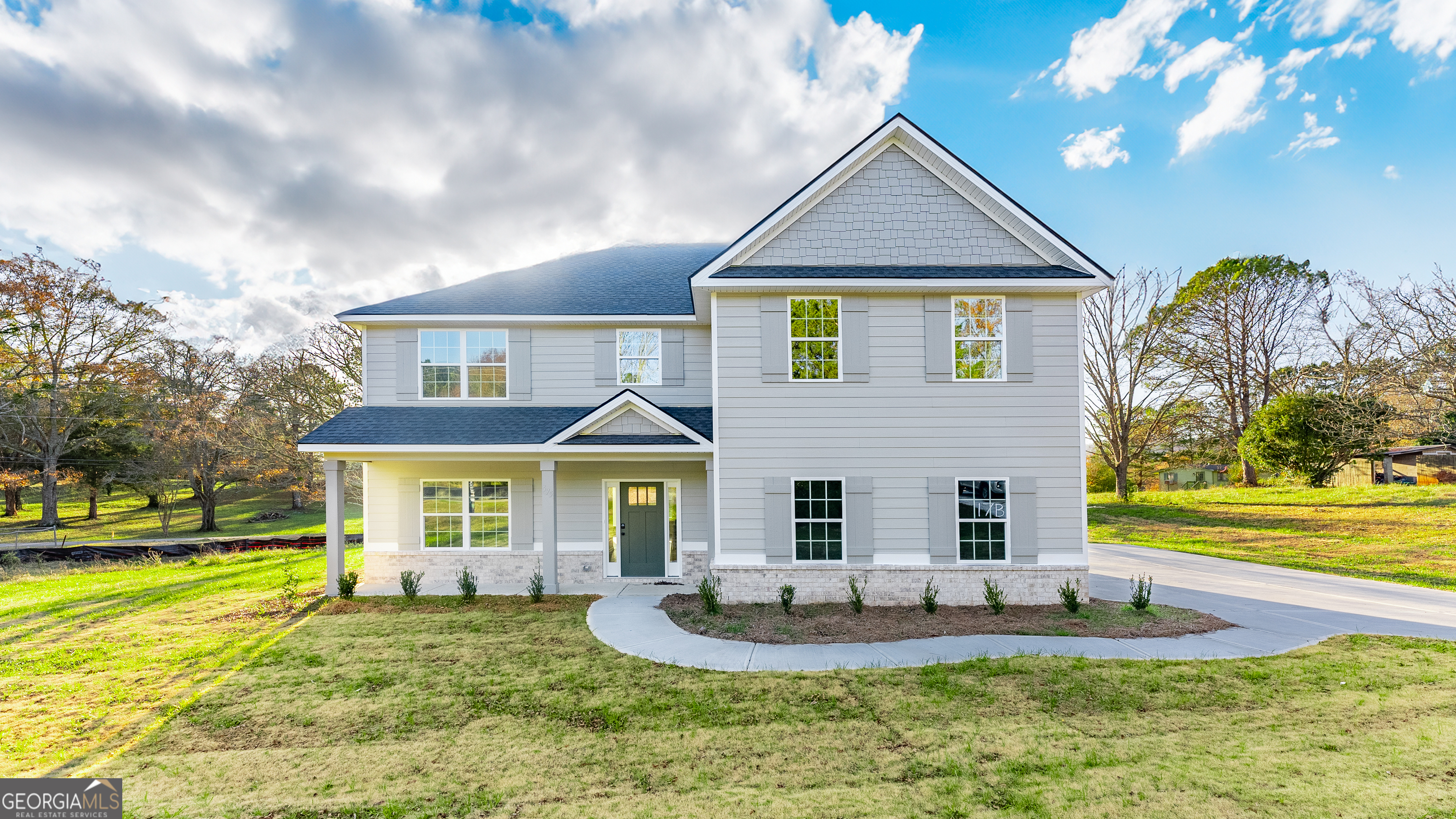 Welcome to Mountain View Road, a Hughston Homes Community! Nestled amidst historic Hamilton Square. Our Cannaberra B Floorplan is Stunning & Stylish with 2864 Sq.Ft. of Elegant Living Space sitting on 1.04 Acres in Harris County. Step into the Inviting Entry, Formal Dining Room, Spacious Great Room, Open Kitchen, 5 bedrooms, 3 Baths, 2-car side-entry garage, & Our Signature Gameday Patio perfect for Outdoor Entertaining. Elevate your lifestyle with Home Automation, Keyless Entry, Video Doorbell, Automated Front Porch Light, and more! Harris County Rural Retreat! Natural Light galore in the Entry Foyer, Formal Dining w/ Tons of Detail, Spacious Great Room features Wood Burning Fireplace, Open Kitchen w/ Tons of Stylish Cabinetry, Granite Countertops, Tiled Backsplash, Stainless Electric Range w/steam clean, Microhood & Dishwasher. The Huge Kitchen Island & Walk-in Pantry for additional Storage. Owner's Entry Boasts Signature Drop Zone, the ideal Catch-All. 5th Bedroom & Full Bath Conveniently located on Main Level. Upstairs features a Generously Sized Owner's Suite, Owner's Bath w/ Garden Tub, Tiled Shower & Huge Walk-in Closet. Additional Bedrooms offer tons of Closet Space. Laundry & Hall Bath are just steps away from the Bedrooms. Enjoy Hardwood Flooring throughout Living Spaces on Main Level & Tons of Hughston Homes Included Features. Our Gameday Patio w/ Wood Burning Fireplace is the Perfect Space for Fall Football.