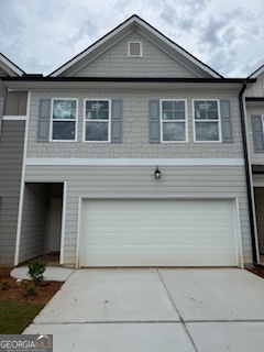 Ask me about our Incentives!!!Modern Luxury Townhome in Rivershire Place. Nestled in the sought-after Villa Rica area, Rivershire Place offers a harmonious blend of modern living and convenience. This meticulously designed townhome features an open-concept layout, high ceilings, and a smart home technology package. Modern kitchen with stainless steel appliances, 42" white cabinets, tile backsplash, granite countertops, large island, and pantry. Oversized owners' suite with walk-in closet and spa-like ensuite bathroom with oversized shower. All rooms equipped with 2" faux wood blinds. Scheduled to be completed in December. Conveniently located just minutes from I-20 and Downtown Villa Rica, offering diverse dining options. A short drive to Sweetwater Creek and Arbor Place Mall adds to the appeal of this vibrant community. Please schedule an appointment to tour our decorated model homes. Home is completed. Exterior is exact photo. Interior photos are stock photos of the decorated model home with the same floor plan.