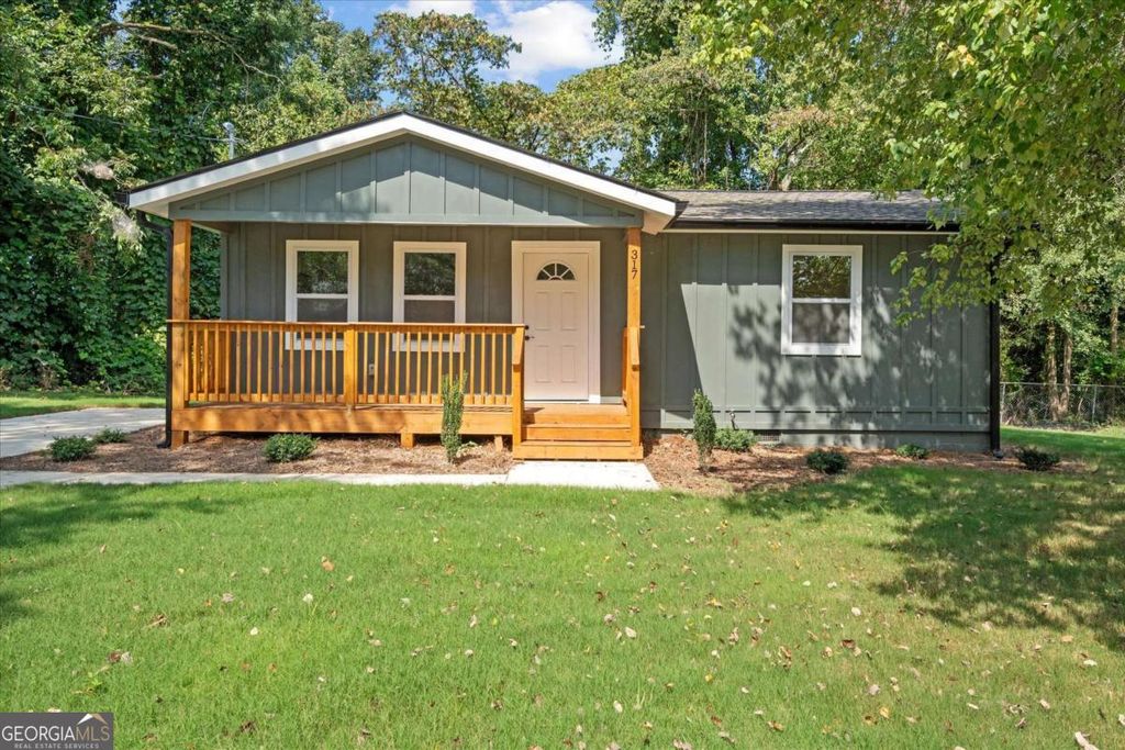 Photo of 317 Bledsoe Street, Carrollton, GA 30117 (MLS # 10692579)