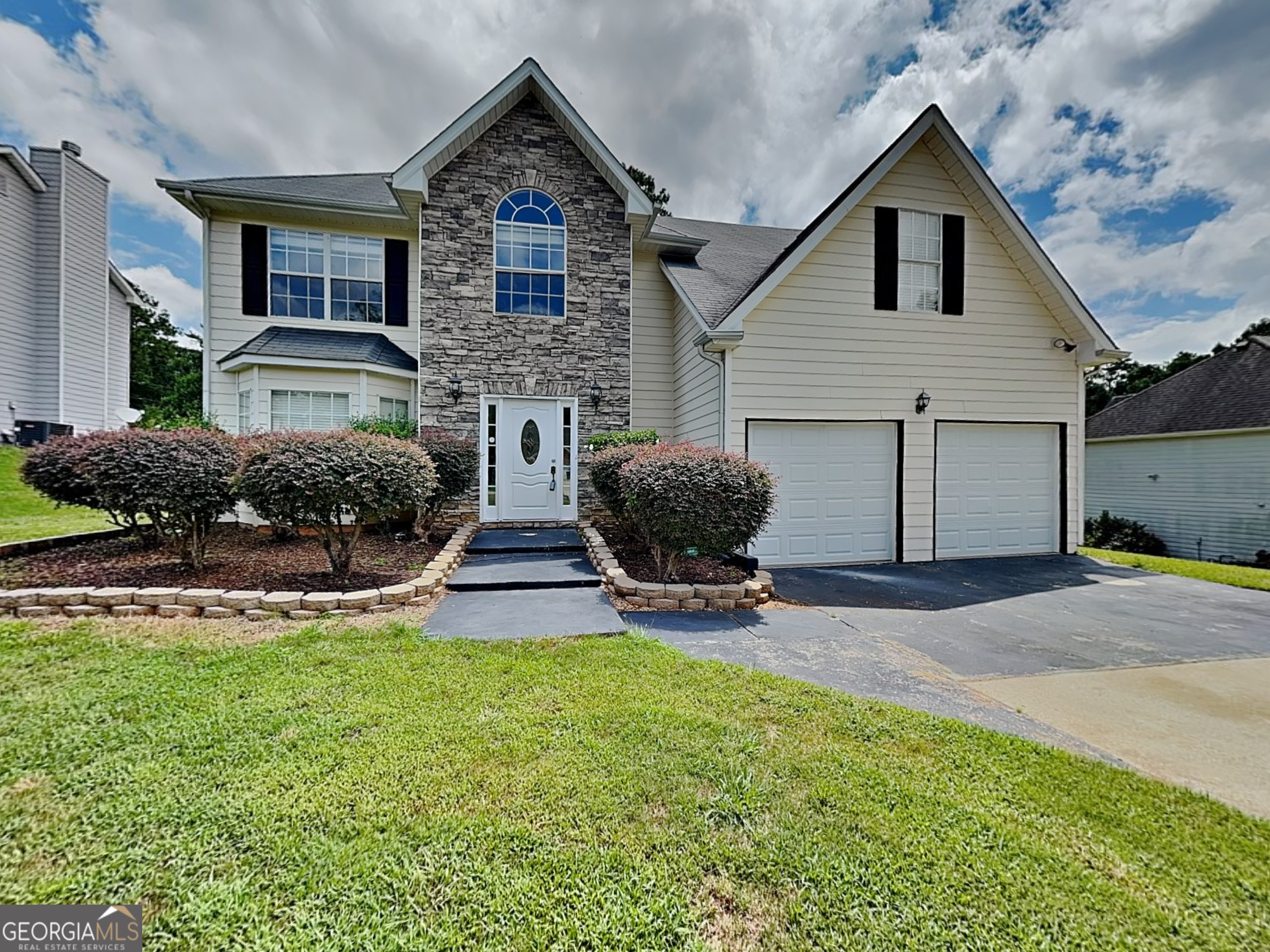 Welcome Home to 109 Barrington Parkway - Where Space Meets Style in Stockbridge! Get ready to fall in love with this 4 bed / 2.5 bath beauty nestled in the sought-after Barrington subdivision in Henry County! From the moment you arrive, this home wows with a decorative glass front door flanked by side windows, adding curb appeal and charm right from the start. Step inside to a grand foyer with a coat closet that opens into a light-filled floor plan with laminate, carpet, and vinyl flooring throughout. The spacious kitchen is a dream with black appliances, including a side-by-side refrigerator with icemaker, built-in microwave, dishwasher, and garbage disposal. Enjoy tons of counter and cabinet space, a massive breakfast island, and a walk-in pantry with custom shelving. Enjoy meals in your separate dining room with a ceiling fan, or entertain guests in one of the two oversized bonus rooms - perfect for a game room, movie night, or cozy fireside hangout. Slide open the doors and step into your fully fenced backyard oasis with two levels of patio space ideal for grilling, lounging, or weekend gatherings. Need flexible space? The 2-car garage has been upgraded with flooring, shelving, and two ceiling fans - ideal for a home gym, workshop, or hobby zone. Upstairs, retreat to the massive master suite with dual ceiling fans, sun-filled windows, and generous closet space. The master bath boasts a separate shower and soaking tub, flanked by double windows for a spa-like feel. Additional features include: Interior panel doors throughout First-floor laundry room Bay windows in front rooms for extra sunlight Two gated entries to the backyard Large lot with mature landscaping Conveniently located near shopping, restaurants, and easy highway access. Zoned for top-rated Pleasant Grove Elementary, Woodland Middle, and Woodland High School. Don't miss this opportunity to own a home that checks ALL the boxes - style, space, and location. Schedule your tour today and make 109 Barrington Parkway your next move!