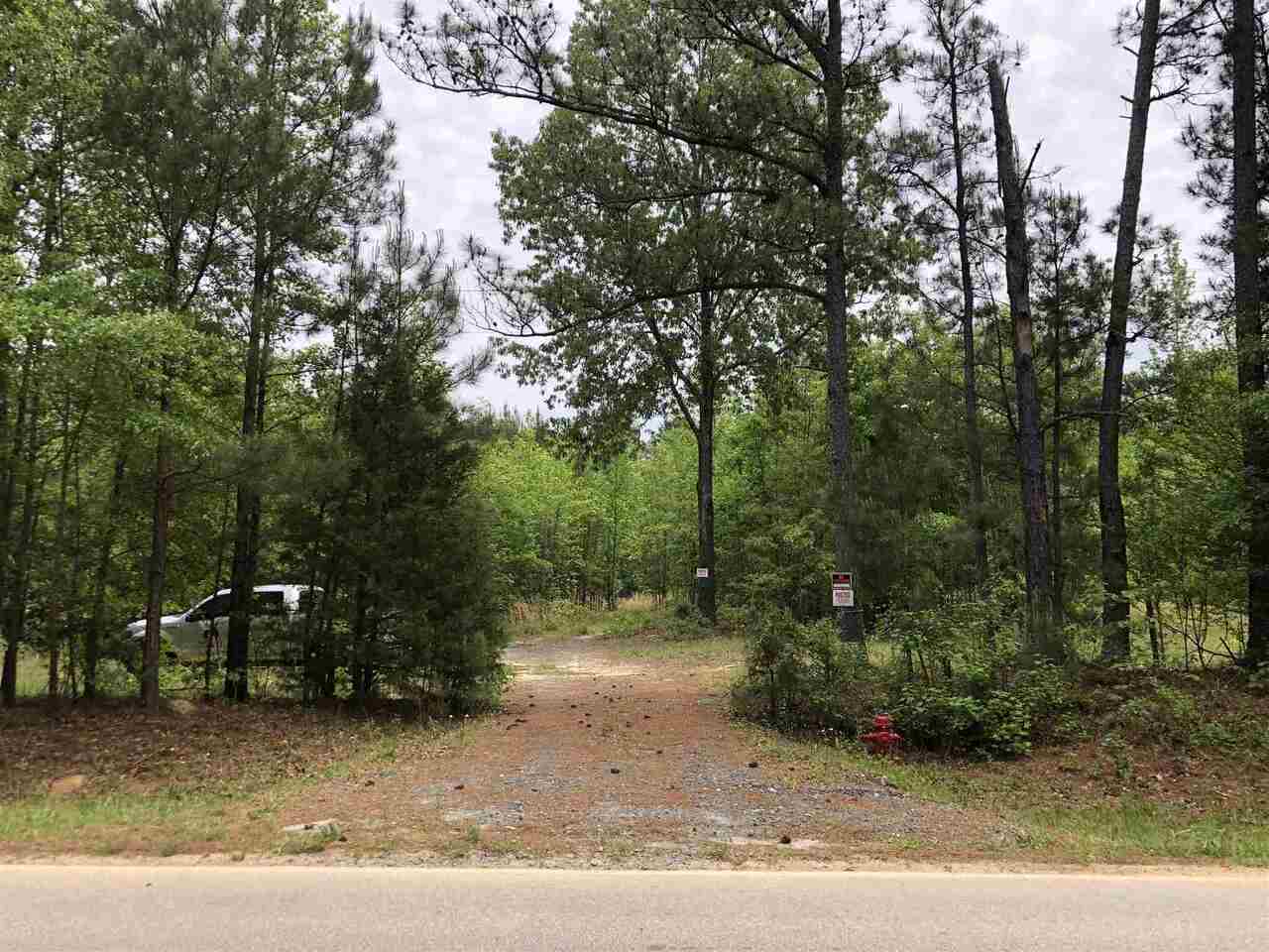 Looking for a nice country setting to build a new home? This 5.33 acre corner lot has 598 foot of paved road frontage on Five Points Road and 356 foot of frontage on adjoining Wilson Road. Previous owner had driveway installed and cleared for home site. County water and other utilities are accessible. Great location, just 3 minutes from Milner. Great hunting property, enjoy the wildlife including deer and turkey. This property will require an Eljen Septic System. Owner can provide soil analysis conducted from March, 2019.