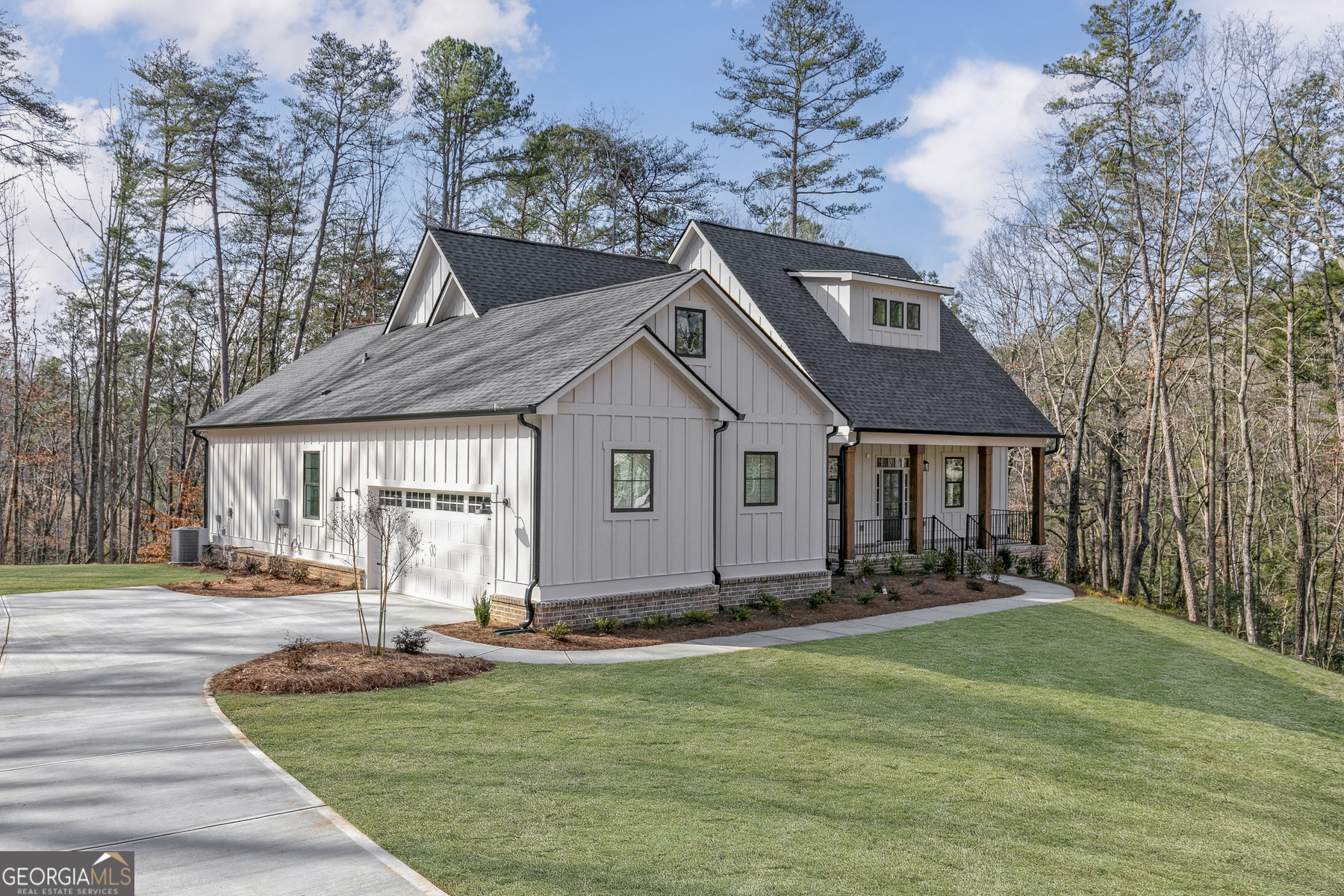 The Yonah | Elevated Living on an Acreage Homesite Welcome to The Yonah, a striking modern farmhouse where form meets function in the most elegant way. This thoughtfully designed split-level home offers timeless curb appeal with its charming exterior and sprawling covered front porch, while the open and airy interior provides a lifestyle of ease and sophistication. From the moment you step through the inviting entryway, you'll be captivated by the seamless flow of the open-concept living areas. The chef-inspired kitchen is the heart of the home-featuring granite countertops, stainless steel appliances, a gas cooktop with griddle, subway tile backsplash, and a generous island ideal for gathering. Just steps away, the dining area and spacious family room with a cozy gas fireplace create the perfect backdrop for both everyday living and special celebrations. Designed with versatility in mind, this home offers two spacious secondary bedrooms, perfect for children, guests, or a home office. At day's end, retreat to the private master suite, complete with a luxurious soaker tub, separate glass-enclosed shower, and an expansive walk-in closet. Entertainment extends outdoors with a covered back patio and built-in outdoor kitchen, offering the ideal space for al fresco dining and relaxed gatherings. Need room to grow? The unfinished basement is stubbed for a full bath, providing endless potential for future expansion. Distinguished Features Include: * Chef-ready kitchen with granite island & gas cooktop * 42" upper cabinets with crown molding & walk-in pantry * Private master suite with spa-like bath & oversized walk-in closet * Covered front porch & outdoor kitchen for year-round enjoyment * Spacious laundry room with ample storage * Stainless steel appliances & ceiling fans throughout * Acreage homesite with attached two-car garage * Unfinished basement stubbed for a full bath-ready for your vision With its blend of modern luxury, flexible living space, and stunning design details, The Yonah is more than just a home-it's a lifestyle. Come experience it for yourself.