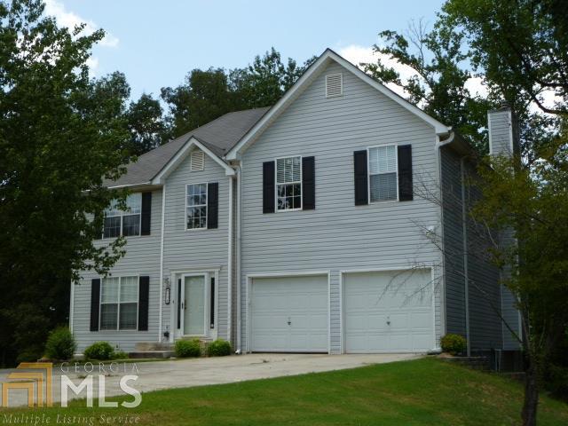 Located in the coveted Carriage Lakes subdivision in Stockbridge and within the highly sought-after Dutchtown school district, this beautiful two-story traditional home is a must-see! It features a spacious family room, separate living and dining areas, new flooring, a finished basement and a two-car garage. The exterior boasts a two-story deck and patio, perfect for entertaining, along with a fenced-in backyard offering privacy and space for outdoor activities.