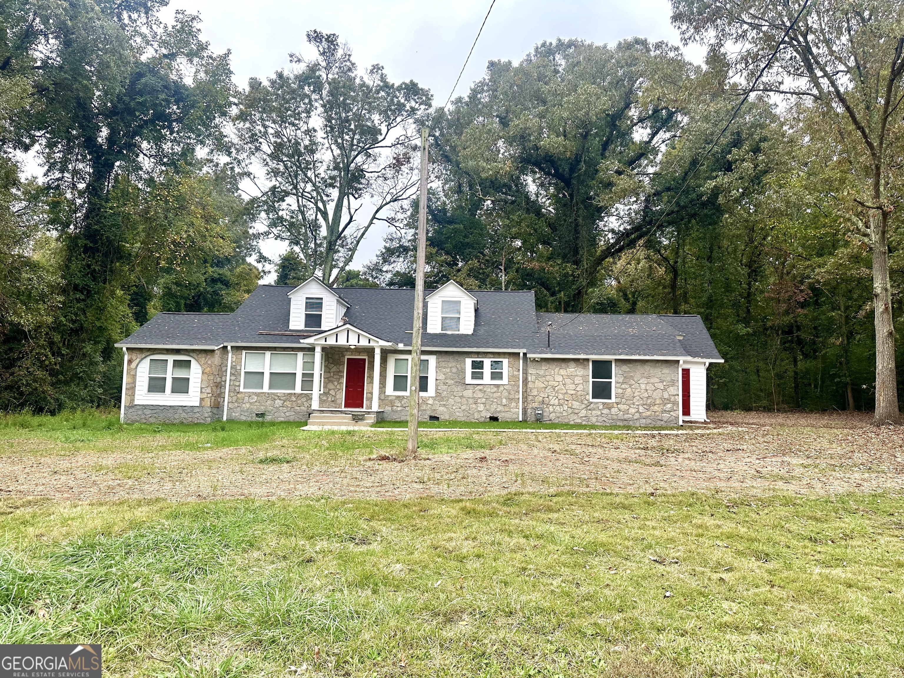 FOR LEASE: THIS HOMES HAS BEEN COMPLETELY RENOVATED WITH 3 BEDROOMS, 2 BATHS, LARGE FAMILY ROOM WITH FIREPLACE AND EAT IN KITCHEN COMBO. 2 BEDROOMS DOWN WITH 1 BATH AND SEPARATE SUNROOM. UPSTAIRS FEATURES 1 BEDROOM AND 1 BATH WITH OFFICE AREA OR PLAY AREA. DBL GARAGE WITH LAUNDRY ROOM AND LARGE STORAGE AREA. SITS ON 3.4 ACRES. OWNER REQUIRES CREDIT CHECK WITH A 2 YEAR LEASE. $2300 PER MONTH