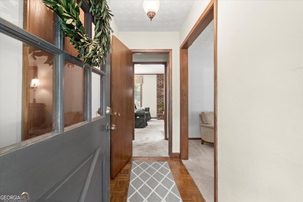 Photo of 3379 Mountain Hollow Drive, Marietta, GA 30062 (MLS # 10763044)
