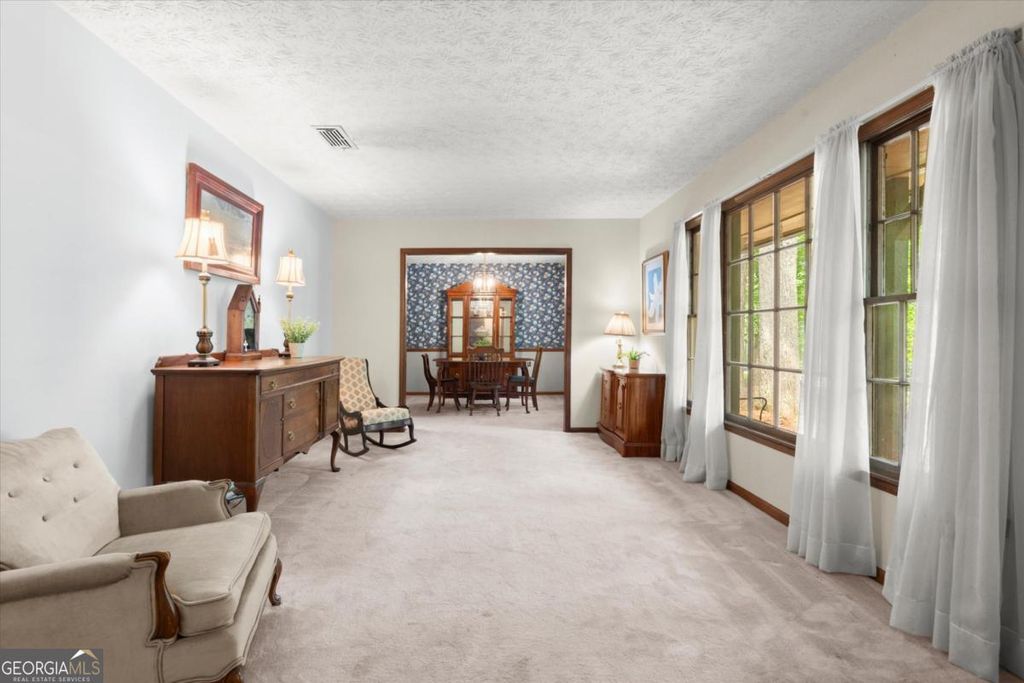 Photo of 3379 Mountain Hollow Drive, Marietta, GA 30062 (MLS # 10763044)