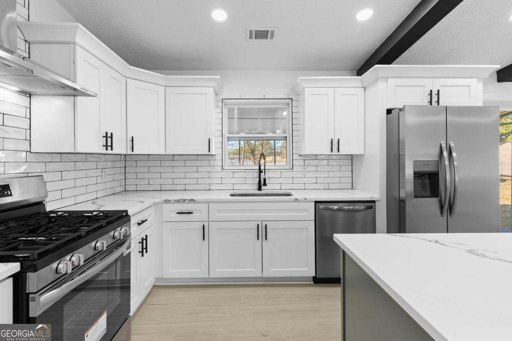 Photo of 693 Highland Loop, Lawrenceville, GA 30046 (MLS # 10663836)