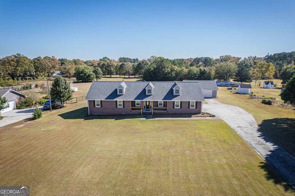 Photo of 3860 Tom Brewer Road, Loganville, GA 30052 (MLS # 10638812)
