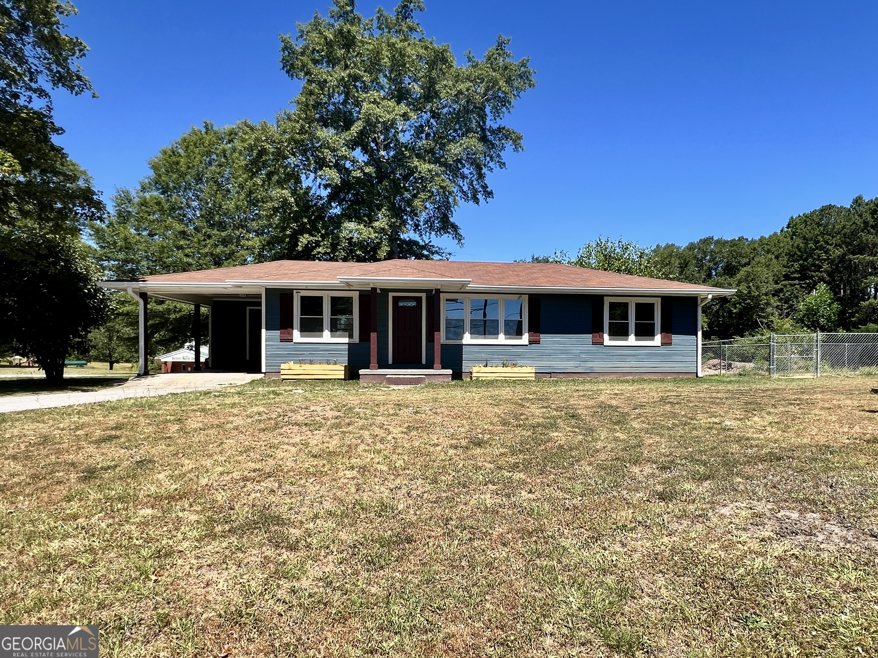 BACK ON THE MARKET - Buyer's Financing Fell Through. Seller very motivated, please bring all offers! Welcome to your perfect home sweet home! This charming ranch-style house features 3 cozy bedrooms and 2 beautifully updated bathrooms, offering a warm and inviting atmosphere. Located at HWY 27 and just minutes to Interstate 20, you'll enjoy convenient access to wherever you need to go. Inside, you'll find gleaming hardwood floors throughout and ceramic tile in the kitchen and baths. The kitchen, dining and living areas are perfect for relaxing or entertaining friends and family. With a roof, HVAC and septic system all only 3 years old, you can move in with peace of mind and start making memories right away. Meticulously renovated and lovingly maintained, this home is truly move-in ready. Don't miss your chance to make it yours, schedule a showing today and fall in love!    Potential Commercial location at a traffic controlled intersection on a major hwy.