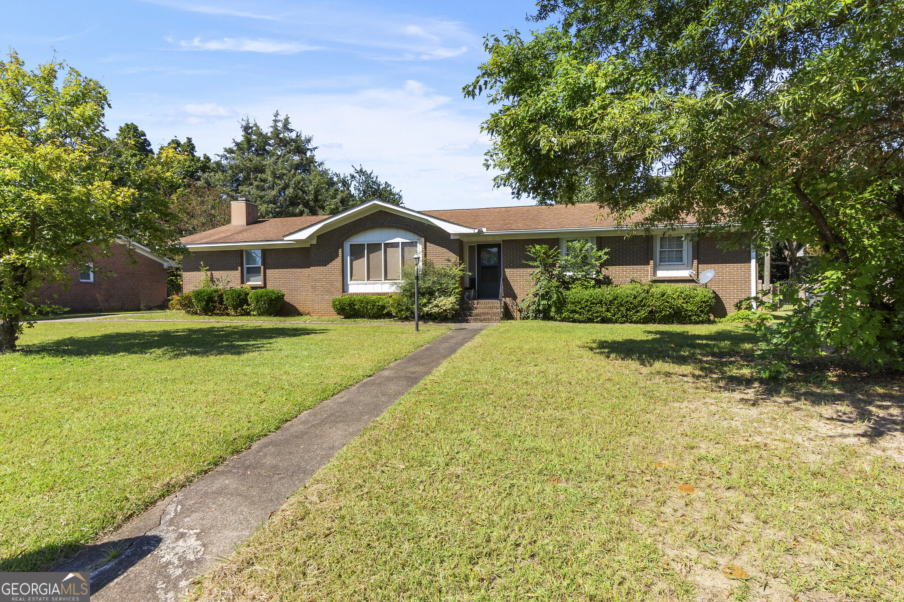 Welcome to this 4-sided brick ranch, featuring 4 bedrooms and 2.5 bathrooms, perfectly designed for comfort and convenience. The garage has been thoughtfully closed in, offering additional living space that can serve as a bonus room, flex space, home office, or playroom. Sitting on a .32-acre lot, this home provides a generous yard for outdoor gatherings, gardening, or simply relaxing in your own space. The durable brick exterior ensures lasting quality and low maintenance. Inside, the flowing floor plan makes it easy to host family and friends while giving everyone room to spread out. Don't miss the opportunity to make this home yours-perfect for those seeking space, value, and the charm of a classic brick ranch!
