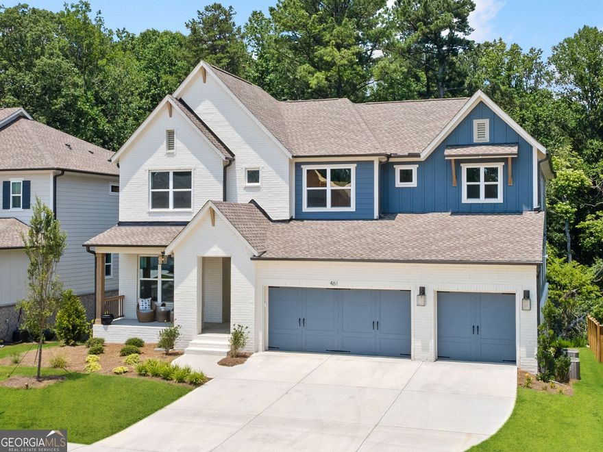 If you've been waiting for the perfect mix of luxury, location, and lifestyle-this is the one. 461 Maypop Lane is a stunning move-in-ready home in Woodstock's Havencroft community with over 5,300 square feet of beautifully designed living space.** You'll love the sunny open floor plan, soaring 10-foot ceilings, and wide-plank hardwoods throughout the main level. The chef's kitchen is the true heart of the home-complete with a granite waterfall island, Whirlpool stainless appliances, a walk-through pantry, and a secondary prep area tucked behind the scenes for entertaining ease. Hosting? The dining room has 12 feet of custom cabinetry and countertop space ready for serving and storage.** Open the tri-fold sliding doors to your covered porch and imagine relaxing evenings or summer gatherings. The flat backyard backs up to trees-ideal for a dream pool or peaceful retreat.** Need flexibility? The main-level bedroom, complete with a full bath, is perfect for guests or a home office. Upstairs, the private primary suite feels like a luxury hotel-with a frameless shower, soaking tub, dual vanities, and a large closet. The fully finished basement adds more living space, another bedroom and bathroom, storage, and endless possibilities-media room, gym, guest suite, or all of the above.** Havencroft is a quiet, upscale neighborhood with a low HOA, just minutes from Downtown Woodstock and easy commuter routes. Enjoy top-rated schools, shops, parks, trails, and everything this vibrant town offers-without waiting on builder timelines.** Move-In Today. Seller Concessions provided for December 2025 close.**