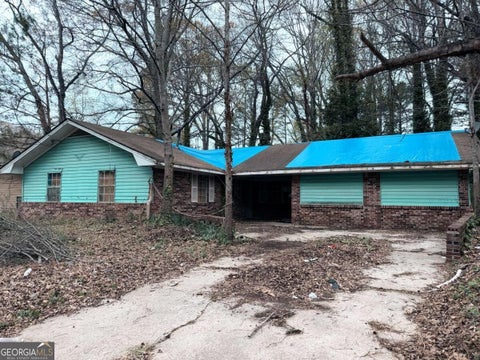 Photo of 2430 Cheryl Lynne Lane, Atlanta, GA 30349 (MLS # 10877681)