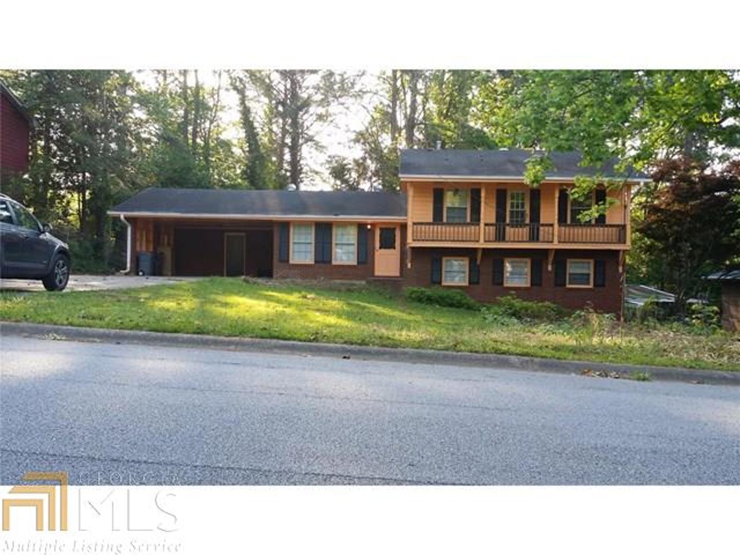 Don't miss this movein ready large size 4 bedrooms and 3 full baths with 2 master bedrooms in quiet area! Hardwood throughout and tile bathrooms, 2 car carport, and back deck with open view to fenced in back yard. This property has always been a rental property; No seller disclosure statements or letter will be provided.