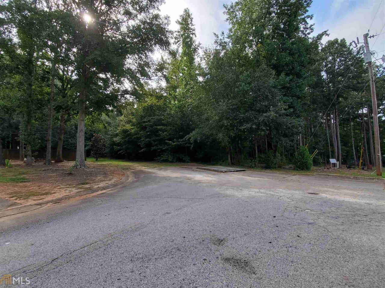 Level Building Lot For Sale: Approx 2.94 acres available for Single Family Residential use. Could potentially be a site for 2 houses - road frontage variance needed. Call agent before walking the property please. #YourSouthAtlRealtor