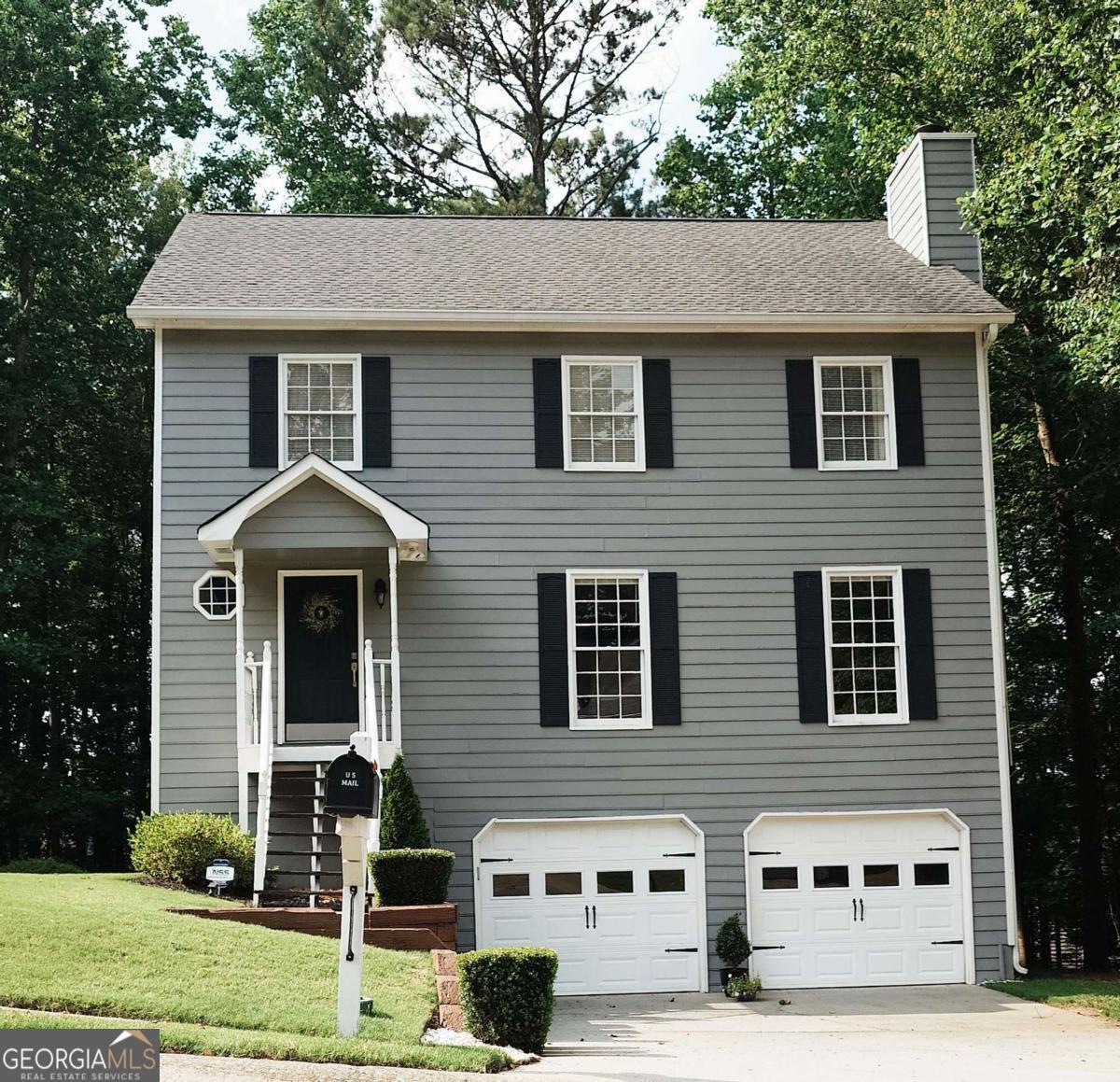 Move-in ready traditional home in sought-after Hamby Place! Welcome to 1886 Hamby Place Drive. This beautifully maintained 3-bedroom, 2.5-bathroom two-story home offers the perfect blend of convenience, comfort, and community. Step inside to a bright and welcoming main level featuring a cozy family room with a fireplace for relaxing evenings at home. The eat-in kitchen includes classic white cabinetry, a spacious pantry, and a sunny breakfast area with views of the serene backyard. The separate formal dining room is ideal for more formal meals or entertaining. A powder room on the main level offers convenience for guests. Upstairs, the spacious primary suite is a peaceful retreat featuring a tray ceiling, walk-in closet, and ensuite bathroom complete with a double vanity, soaking tub, and separate shower. Two additional bedrooms share a full bathroom, and the conveniently located laundry room makes daily routines a breeze. Enjoy your morning coffee or evening unwind on the private back deck overlooking the tranquil backyard. A large two-car garage provides ample storage space and room for projects or hobbies. Situated in a friendly swim/tennis community, this home is just a short drive to local parks, schools, shopping, dining, and I-75 express lanes! Don't miss this opportunity to enjoy living in a location that has it all!