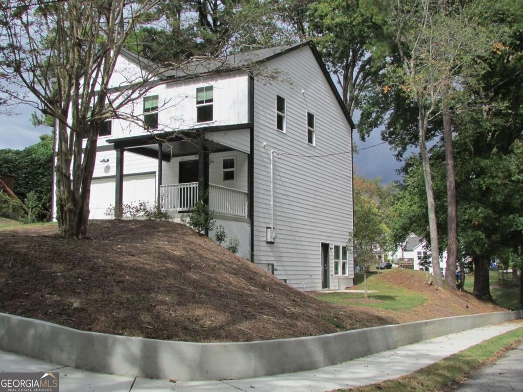 Photo of 2367 Summit Avenue NW, Atlanta, GA 30318 (MLS # 10849719)