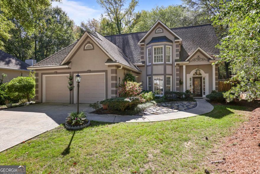 Welcome Home! This beautiful, well-maintained traditional home situated on 1/2+ acres has it all! Kennesaw Battlefield National Park right out the back door, close to bustling Marietta Square, and located in highly sought after Lee's Crossing with its quiet neighborhood streets, sparkling Swim/Tennis facilities and all its fabulous amenities!  The first floor boasts a spacious primary suite with 2-tiered tray ceiling, double vanity, garden tub, separate shower and ample walk-in closet. A lovely Eat-In Kitchen with updated granite countertops opens to the light filled Great Room. The Dining room features a striking bay window with plantation shutters. A trip up the gorgeous extra-wide staircase to the second floor reveals stunning view down into the great room and front entrance areas. Upstairs you'll find a versatile Sitting Area/Family Room and 3 large Bedrooms and Guest Bath. Take a walk outside to experience the great outdoors where relaxation awaits on your gorgeous wood deck, in your private, fenced backyard! Proceed to the back of the yard to your private entrance to Kennesaw Battlefield National Park and miles of beautiful, wooded hiking trails. Truly a wonderful place to call home!