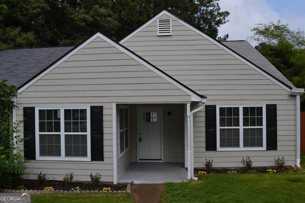 Photo of 5134 Hill Farm Drive NE, Woodstock, GA 30188 (MLS # 10781457)