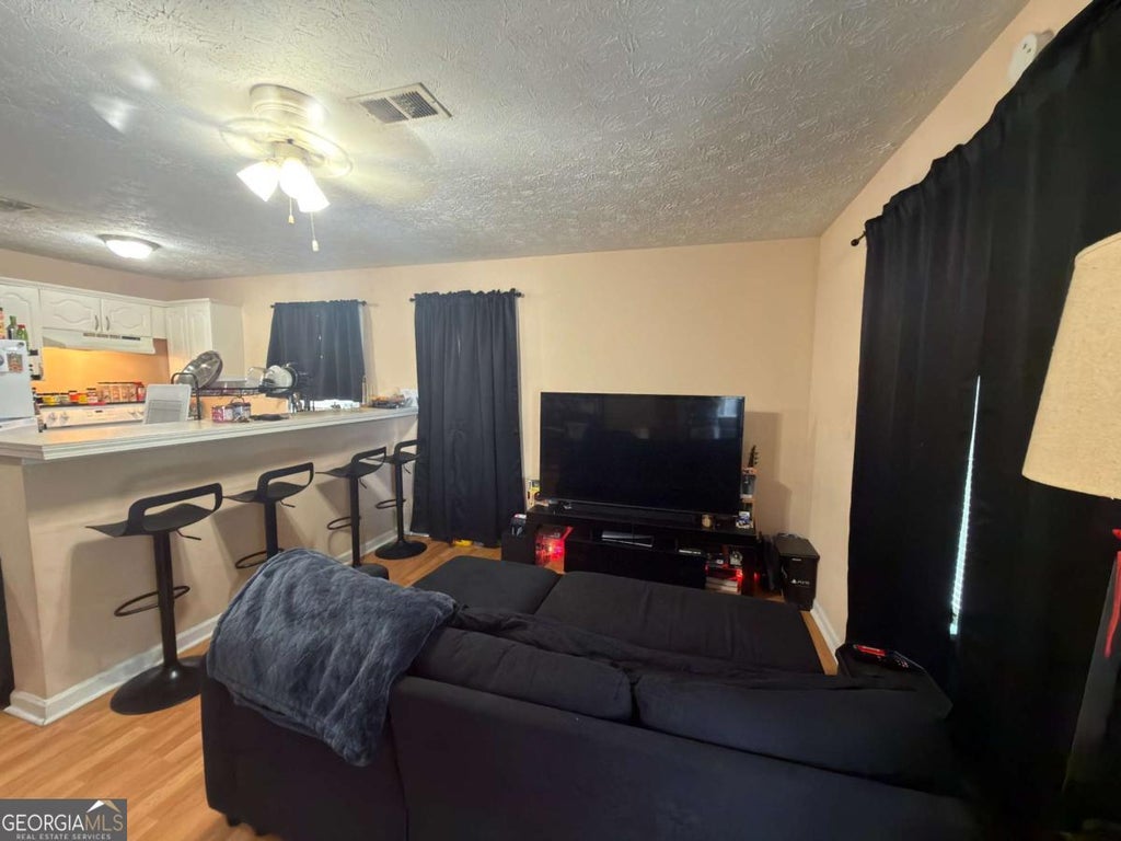 Photo of 5921 PECO Lane #5923, Austell, GA 30106 (MLS # 10809358)