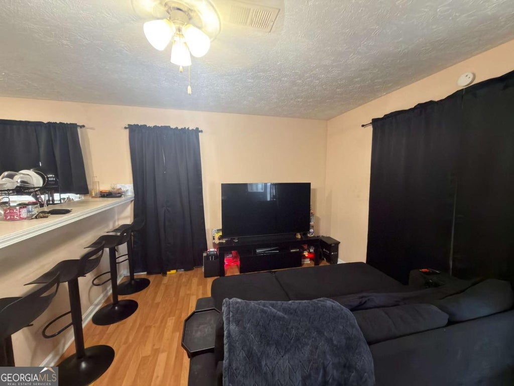 Photo of 5921 PECO Lane #5923, Austell, GA 30106 (MLS # 10809358)