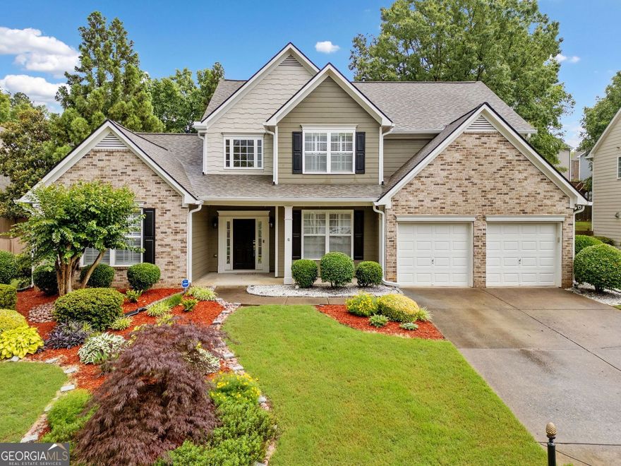 This Primary on Main home features a lovely design and a great Kennesaw location. It's just a short walk from the trails and views of Kennesaw Mountain. When you enter, you'll see a spacious, open floor plan. The two-story foyer welcomes you. The family room is also dramatic and bright, filled with natural light. The kitchen shines with a large granite island and gas cooktop. It has a beautiful stone backsplash and a walk-in pantry. Plus, there's a spacious breakfast room, great for casual meals. For more formal occasions, there's a separate dining room, as well as a living room that can easily double as a home office.  Upstairs, there are bedrooms that are spacious and comfy. Two have walk-in closets, and one large room is perfect for guests or as a bonus room. The primary suite is on the main level. It boasts an en suite bath with separate vanities for him and her, a garden tub, a walk-in shower, and dual closets for easy organization.  The fenced backyard is a private space. It has been landscaped professionally. This creates a peaceful oasis, ideal for relaxing and unwinding.