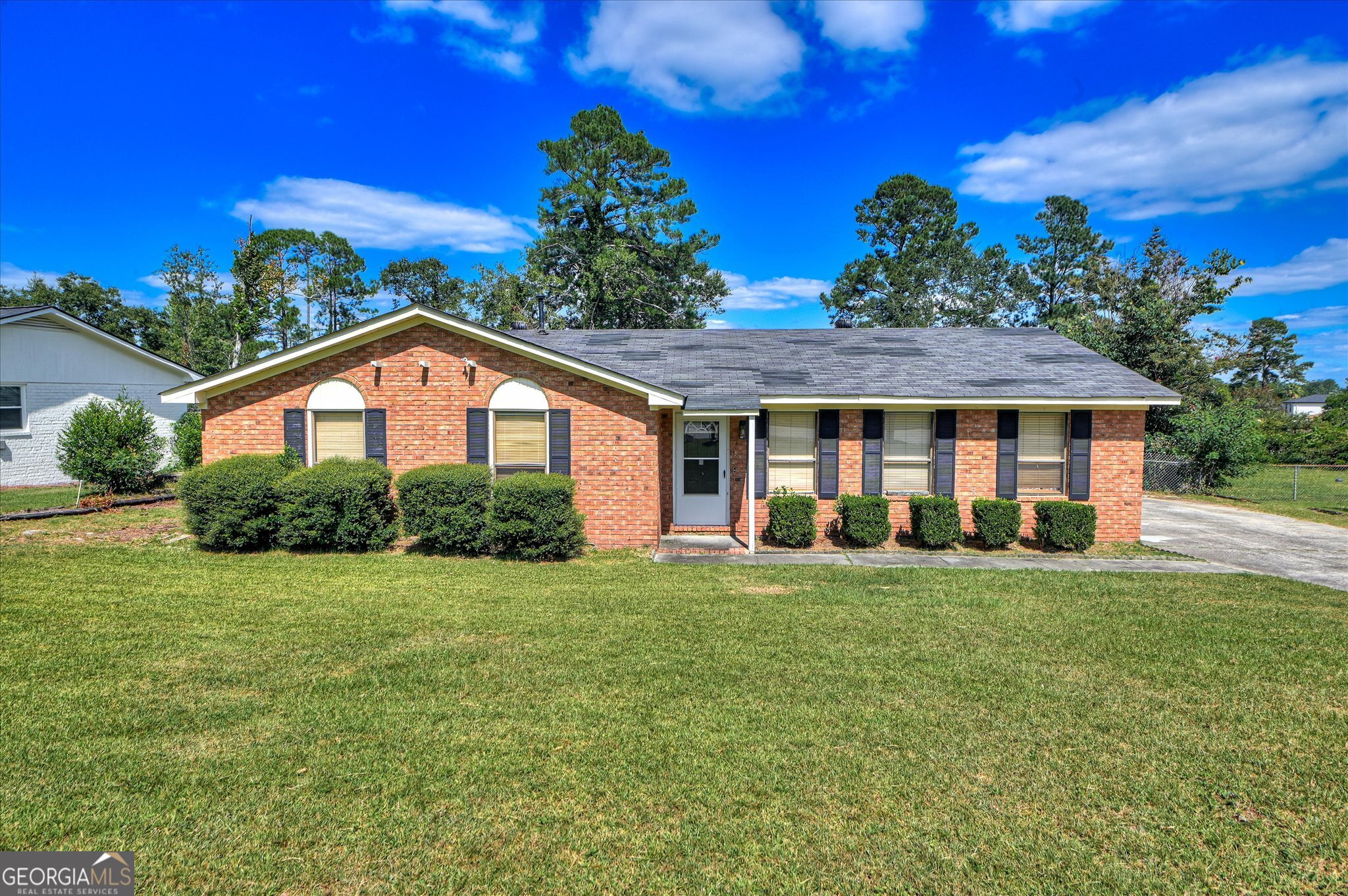 Brick ranch on large lot
