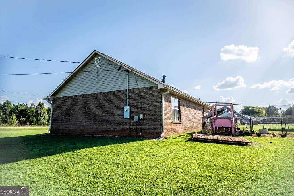 Photo of 309 Snapping Shoals Road, Mcdonough, GA 30252 (MLS # 10812906)