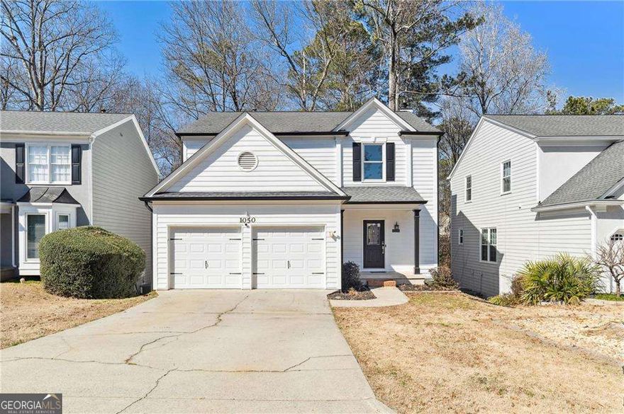 Nestled in the heart of Alpharetta near Newtown Park, 1050 Westwell Run offers a charming and spacious residence perfect for modern living. This well-maintained home features a contemporary design with an open-concept floor plan, allowing for seamless flow between the living, dining, and kitchen areas. The kitchen is equipped with modern appliances, ample cabinetry, and a breakfast bar, making it ideal for both everyday meals and entertaining guests. New Flooring recently installed on the main floor and a new, larger deck, as well. The master suite provides a private retreat with a generous bedroom space, walk-in closet, and an en-suite bathroom featuring dual vanities, a soaking tub, and a separate shower. Additional bedrooms are well-sized and share a full bathroom, accommodating family members or guests comfortably. The outdoor space includes a fenced-in. private backyard, perfect for relaxation or outdoor activities. Located in a desirable neighborhood, this home is conveniently close to local shopping, restaurants , schools, Newtown Park. offering both comfort and convenience for its residents. The community features an inviting pool and other outdoor activities. New water heater installed. New dishwasher Dec 24CO. New metal, insulated garage doors and smart/quiet openers Feb 23CO. New Pergo Outlast flooring installed 23CO. Renovated back deck with Timber Tech, Lifetime boards 21CO. New Trane HVAC, gutters & windows installed in 2018CO.