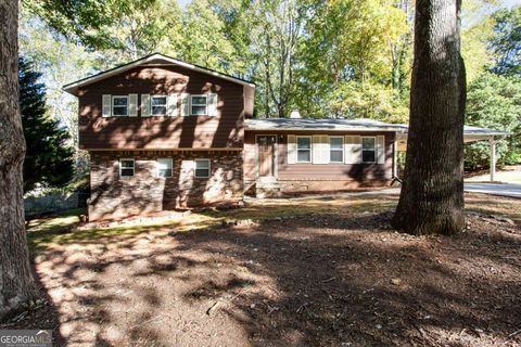 Photo of 954 Camp Creek Drive SW, Lilburn, GA 30047 (MLS # 10638488)
