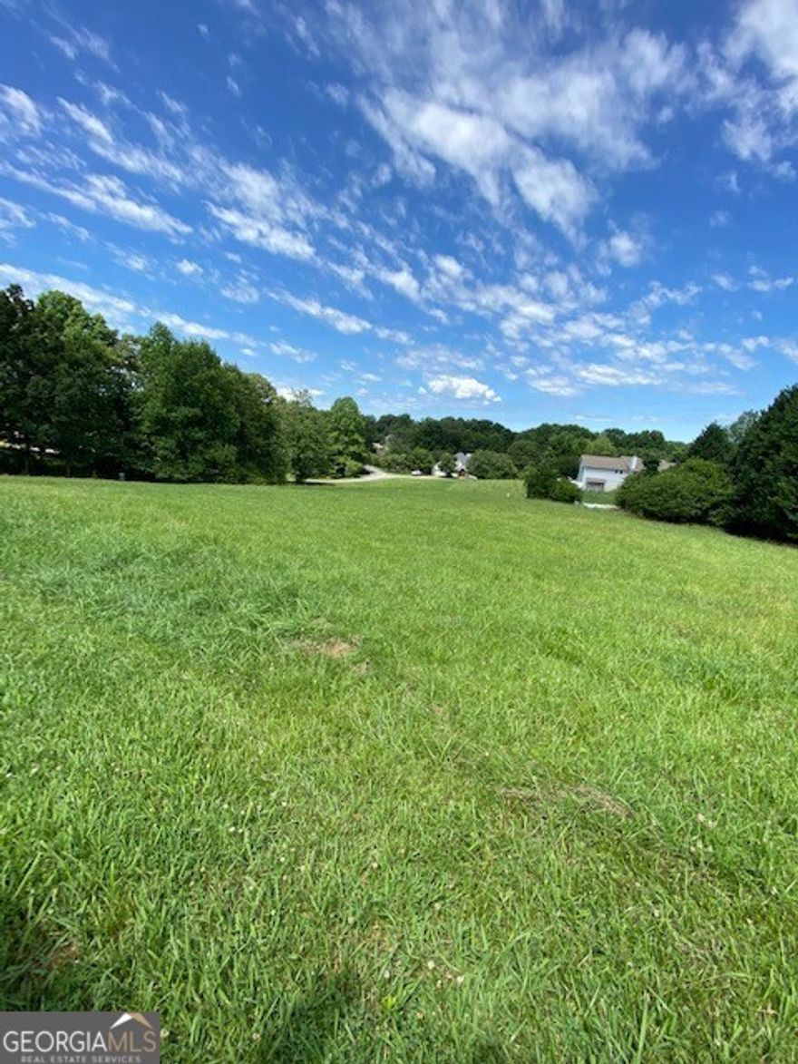 Perfect lot to build your dream home on in a well established neighborhood. The lot lays great and you could also purchase the lot beside it to combine them for more potential. There are amazing views driving up and all through the neighborhood. Close to Downtown Dahlonega and Norht Georgia College. Underground utilities, voluntary HOA, covenants and restrictions.