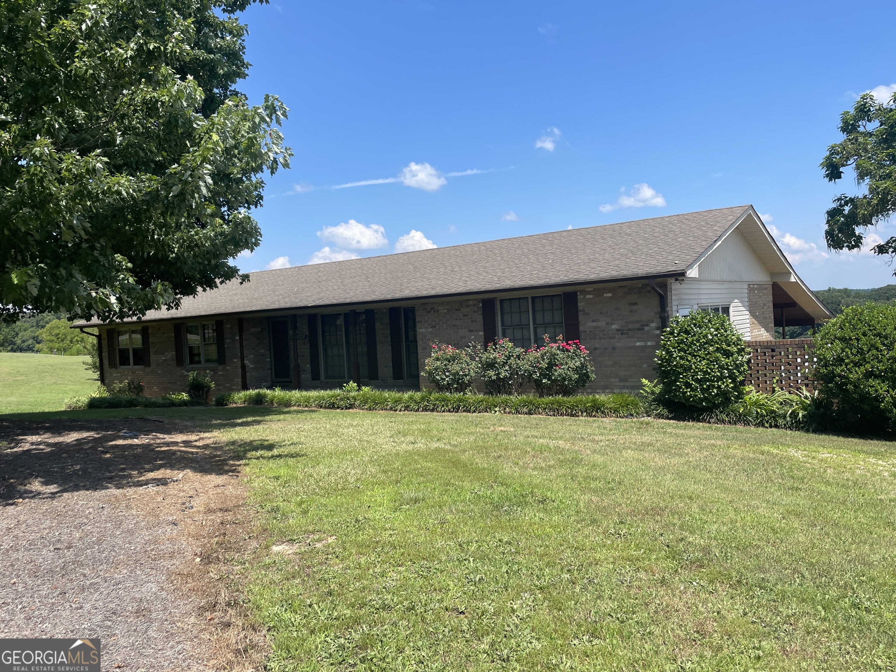 Buy or Trade: Country Living - Great views from back deck - Perfect for a large family. On 1.6 acres, Great Opportunity - Lease Purchase / Owner Financing - Public Viewing Saturday, September 13th. RSVP at 770-574-1111.