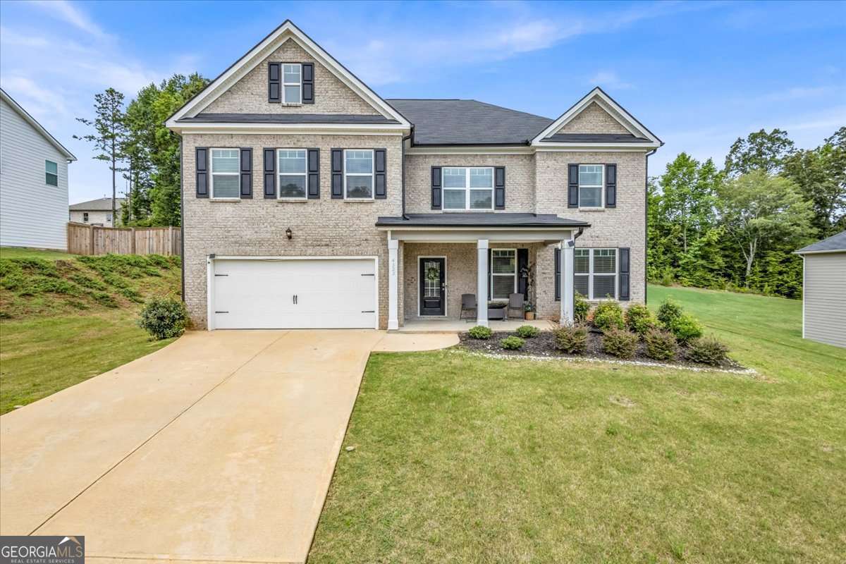 Welcome to The Sinclair Plan in Monet Gardens! This brand new home features 5 spacious bedrooms and 4 full baths in a quiet community of just 18 homes. Enjoy easy access to I-20 along with nearby shopping, dining, and everyday conveniences. The open kitchen includes stainless steel appliances, a large island, and a generous walk-in pantry. A guest bedroom and full bath on the main level make this home ideal for multi-generational living or visitors. Upstairs offers a versatile loft space perfect for a second living area, home office, or playroom. The oversized owner's suite features dual vanities, a large walk-in closet, garden tub, and separate shower. Thoughtfully designed with modern comfort and function in mind - this home has everything you need.