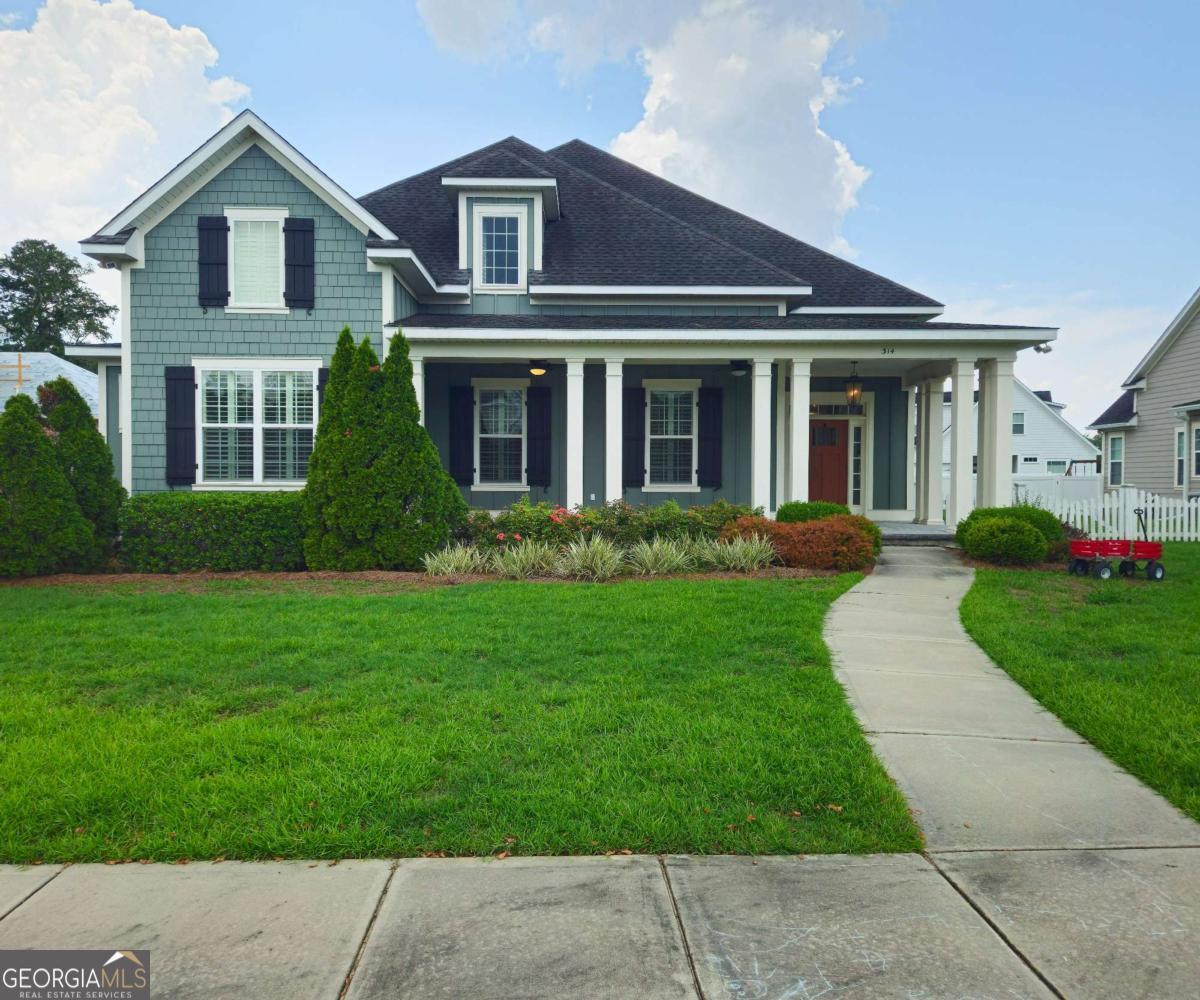 Luxury, Comfort & Community-All in One Stunning Home at Madison Grove! Welcome to a home where everyday living feels anything but ordinary. Nestled in the sought-after Madison Grove community, this beautiful property blends comfort, luxury, and thoughtful design around every corner. Step through the front door and you'll immediately notice the soaring ceilings and natural light that flood the open spaces, creating an inviting atmosphere that feels both grand and warm. The heart of the home-the gourmet kitchen-is a dream for entertainers. Outfitted with stainless steel appliances, a granite-topped bar, and even a water purification system, it's ready for everything from casual breakfasts to lively dinner parties. The open layout flows effortlessly into the main living area, perfect for laid-back evenings or hosting friends and family. And if you're looking for space, you'll love this: not one, but two primary bedrooms are located on the main floor, each with its own beautifully designed private bath featuring custom tilework and stylish vanities. The primary suite goes a step further with double vanities, a deep soaking tub, and a walk-in closet that could rival a boutique. Upstairs, the options are just as impressive. You'll find three spacious bedrooms, a large flex/game room for movie nights or weekend fun, and a fully equipped 24x24 theater room complete with a granite-top bar, refrigerator, microwave, dishwasher-and yes, all the theater gear stays. Outside, relax in your oversized 20x20 screened porch. Whether it's coffee in the morning or cocktails at dusk, it's your private spot to unwind and enjoy the quiet. Throughout the home, you'll find thoughtful custom touches-judge's paneling, plantation shutters, detailed ceiling moldings, rich pecan wood flooring, and an oversized two-car garage with extra storage. But what really sets this home apart is the lifestyle it offers. Madison Grove isn't just a neighborhood-it's a true community. Take advantage of the resort-style amenities including a clubhouse with a gym, a beautiful park, and a sparkling outdoor pool. Whether you're looking to stay active or simply connect with neighbors, it's all here. This is more than just a home-it's where comfort meets luxury in all the right ways. Come see what life in Madison Grove is all about. Bonus: An assumable VA loan option makes this incredible opportunity even more attractive!