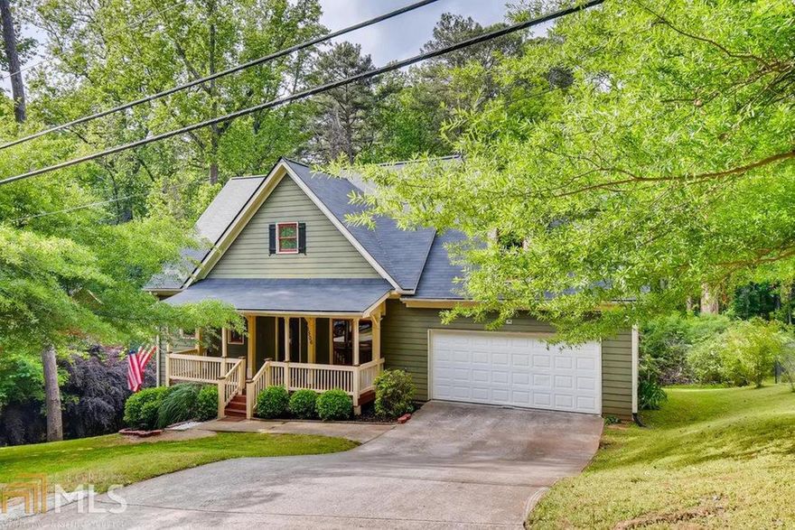 This house is an entertainer's dream. The main level with hardwood floors has a deck off of the back and a rocking chair front porch. The property backs up to a wooded area that gives a sense of being in rural Georgia, yet you are only a few miles from downtown. Kitchen has granite counter tops and stainless steel appliances including a wine cooler and ample dining area. Upstairs owner's suite is spacious with a large shower in the owner's bath and a perfect view of the foliage in the back. Basement has its own kitchenette, living area, bedroom and bath. Basement living area has brand new flooring. Home is near the end of a dead end street, so it makes for a low traffic area. New Roof as of April 2020. New HVACs as of April 2020.