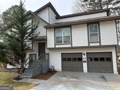 Photo of 1020 Park Forest Drive NW, Lilburn, GA 30047 (MLS # 10635986)