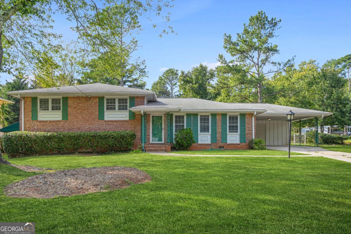 Welcome to 4357 Lafayette Lane - A perfect blend of comfort and convenience! This charming 4-bedroom, 3-bathroom home is tucked away in a quiet College Park community while still offering easy access to the airport, downtown Atlanta, and major highways. Step inside to an inviting open-concept main level, featuring a spacious living room filled with natural light, a modern kitchen with updated appliances, cabinets, countertops, and a dining area perfect for gatherings. Upstairs, you'll find a generous primary suite complete with a walk-in closet and a private bath, along with two additional bedrooms and a full bath for family or guests. The finished basement expands the living space with an additional bedroom, a full bathroom, and a large bonus room-perfect for a home theater, gym, or home office. The huge, fenced-in level backyard offers endless possibilities-plenty of space for entertaining, outdoor play, gardening, or simply relaxing in privacy. Located just minutes from downtown College Park, Hartsfield-Jackson Airport, and local shops and dining, this home is a wonderful opportunity for first-time buyers, families, or investors. Don't miss your chance to own this beautiful home in a prime location! Schedule your private showing today.
