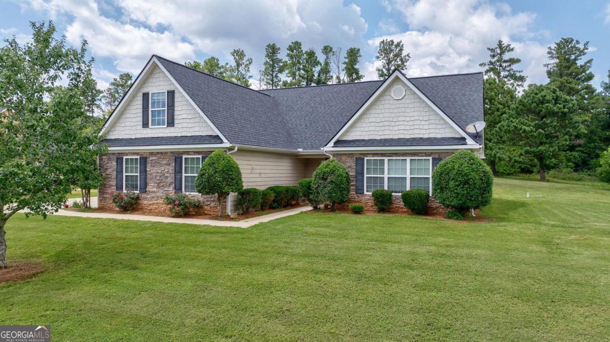 Check out This Four Bedroom-Two Baths Ranch Located in Whispering Lakes Subdivision. One of Madison's Favorite Communities! You are minutes from down Town and all it has to offer. The home also offer a Bonus Room above the Garage perfect for another bedroom or office. A fenced in Backyard makes this home kid and pet friendly. Come see this open floor plan and all it has to offer.