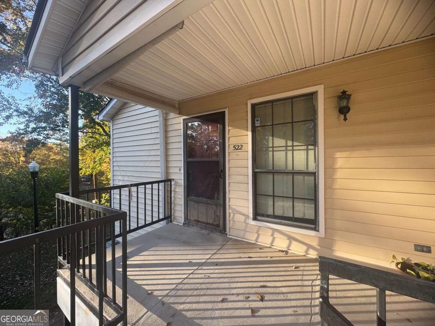 Check out this exciting opportunity for first-time homebuyers ready to add their personal touch! This 2-bedroom, 2-bathroom second-floor condo is being sold AS-IS and priced perfectly for those with vision. While the home needs cosmetic work, the major systems have already been handled for you - the roof, HVAC, and water heater were recently replaced less than 2 years ago, giving you peace of mind on the big-ticket items. Enjoy unobstructed views from your second-floor perch, and take advantage of the incredible community amenities just a one-minute walk away, including a pool, tennis courts, playground, and community center. The HOA covers water and trash collection, making this an even better value. Located conveniently near I-285, shopping, dining, and just 15 miles from downtown Atlanta, this 924 sq ft condo offers the perfect combination of location, potential, and opportunity. Bring your imagination and make this space your own!