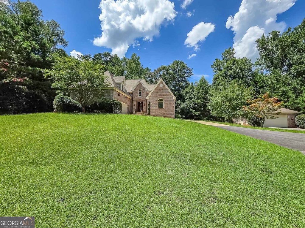 Photo of 5156 Due West Road, Powder Springs, GA 30127 (MLS # 10810484)