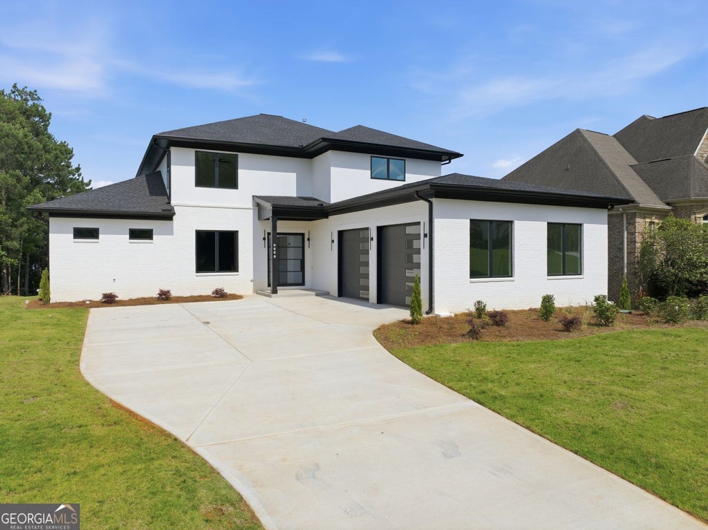 Photo of 2453 Lake Erma Drive, Hampton, GA 30228 (MLS # 10795876)
