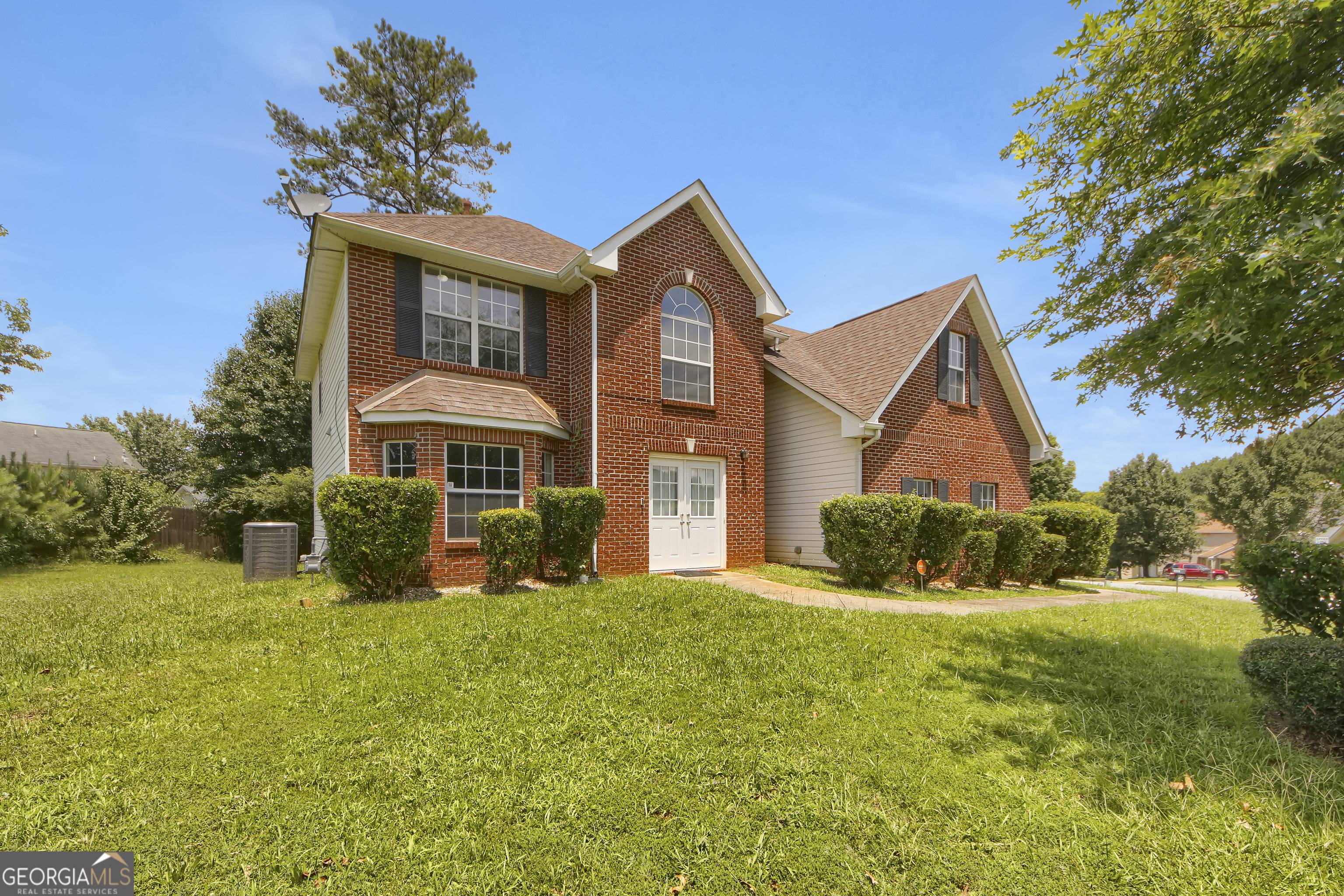 This spacious 4-bedroom, 2.5-bathroom home offers over 2,600 square feet of living space designed for comfort, functionality, and style. The family room featuring a cozy fireplace-perfect for a relaxing evening at home. There is also a flex area that can be used for a home office, game room, or whatever fits your needs. A separate formal dining room and additional living space that offer plenty of room for gatherings and special occasions, along with and a eat in kitchen. Upstairs, you'll find a generously sized master suite with a walk-in closet complete with a soaking tub and separate shower. Three additional bedrooms for family or guest. Outside, enjoy a level lot backyard-ready with a storage shed and fenced area for outdoor fun, pets, or a future garden oasis. Conveniently located near shopping, schools, and major highways, this home offers the perfect balance of peaceful suburban living and accessibility. Whether you're a first-time buyer or growing household, this move-in ready gem is a must-see!