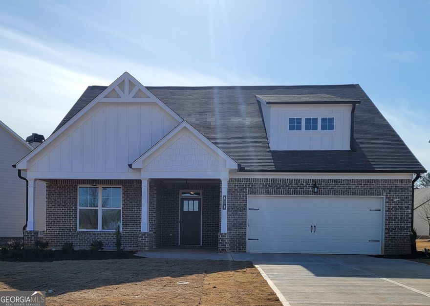 Built by: Labb Homes' the Bailey plan (Lot 63) is waiting for you!  This is the last opportunity to own this plan in this community! It offers a very spacious entry foyer leading to the kitchen which features white cabinets, farmhouse sink, large accent island and stainless steel appliances. Completely open concept has the entire main floor area flowing freely for the best entertainment space! Relax on your covered rear patio or front porch. Owners' suite has an oversized shower and tub and a large walk-in closet. Hard to find guest bedroom on main with full bath is an added plus. In addition, there are two spacious bedrooms upstairs with connecting bathroom. Anticipated completion is mid to late March. STOCK PHOTOS ARE OF A PREVIOUSLY COMPLETED HOME. Updated pictures to follow soon. A closing cost contribution of $10,000 will be set aside for purchaser and paid jointly by Seller and preferred lender, Debbie Williams at Ameris Bank, only. Enclave at Brookside Crossing community has a spectacular recreation center that includes tennis courts, pickle ball, basketball, playground, grilling station, fire pit and swimming pool.