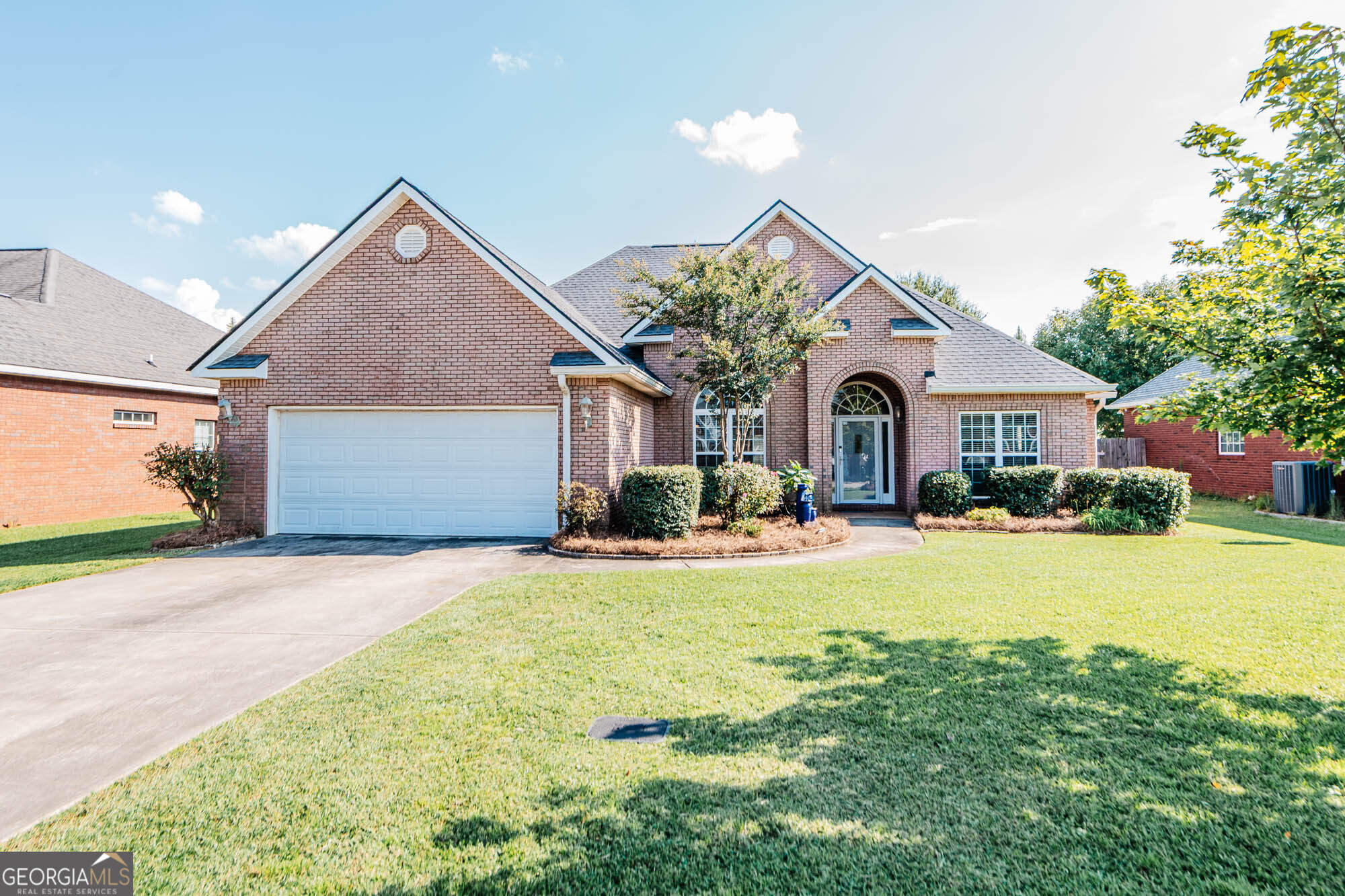 Welcome to 227 Sedgebrooke Drive, a charming all-brick home nestled in the highly sought-after Thornbrook subdivision in Warner Robins. This beautifully maintained 3-bedroom, 2-bath residence offers 1,910 square feet of comfortable living space on a generous 0.35-acre lot. The home features a formal dining room with elegant columns, a spacious great room, a well-appointed kitchen with a breakfast bar and ample cabinetry. The split-bedroom layout ensures privacy, while the luxurious primary suite includes a sitting area, jetted tub, separate shower, and dual vanities. A dedicated laundry room with pantry space adds convenience. Enjoy a back enclosed heated and cooled sun porch overlooking a large, privacy-fenced backyard and outbuilding -perfect for entertaining or relaxing. With an attached two-car garage and proximity to Robins AFB, Watson Blvd, shopping, dining, and top-rated schools, this move-in-ready gem offers the perfect blend of style, comfort, and location.